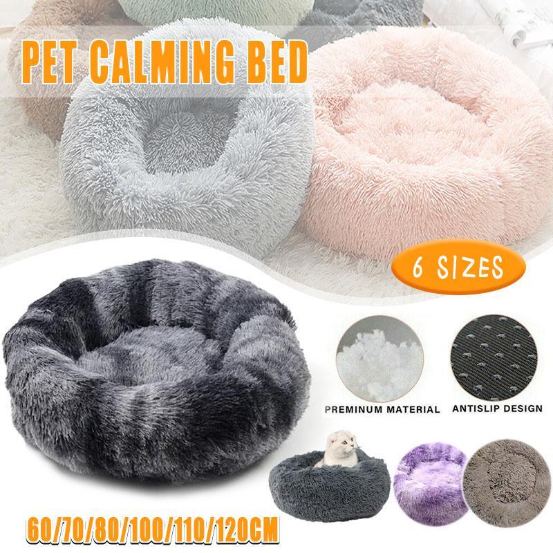 Calming donut dog bed with raised rim for pets